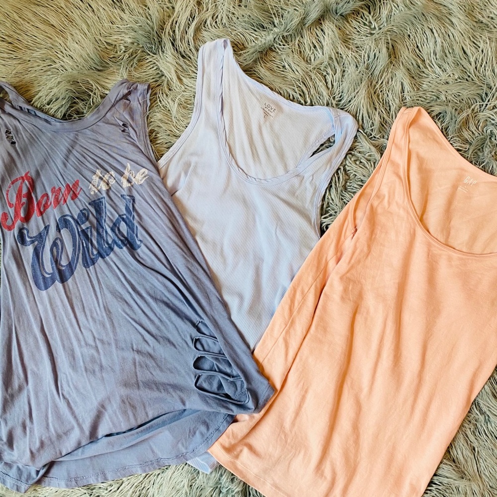 Set of tanks. 3 total. All size large. One NWT